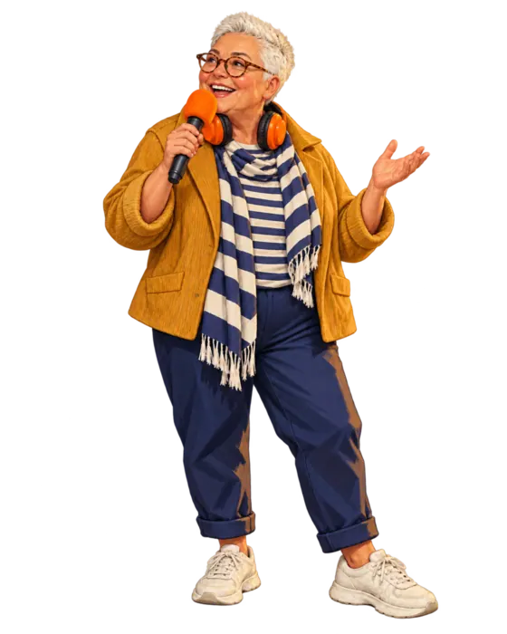 Jo parle dans son micro à bonnette orange.